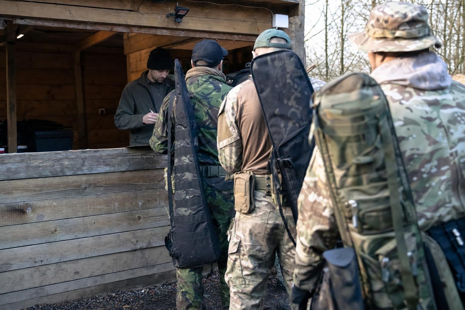 Airsoft players signing in at a site safe zone reception